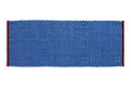 Royal blue long door mat rug by HAY with a textured surface, ideal for entryway decor and durability.