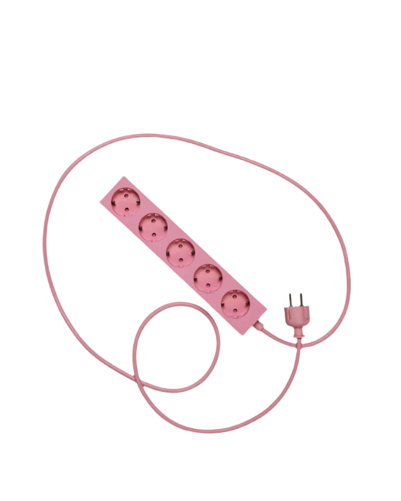 Pink power strip with multiple outlets and a plug on a white background