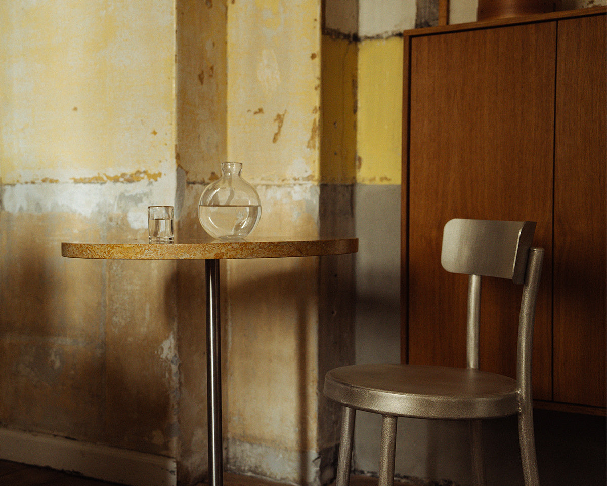 FRAMA - Table 57 | Yellow Limestone / Stainless Steel | Ø70